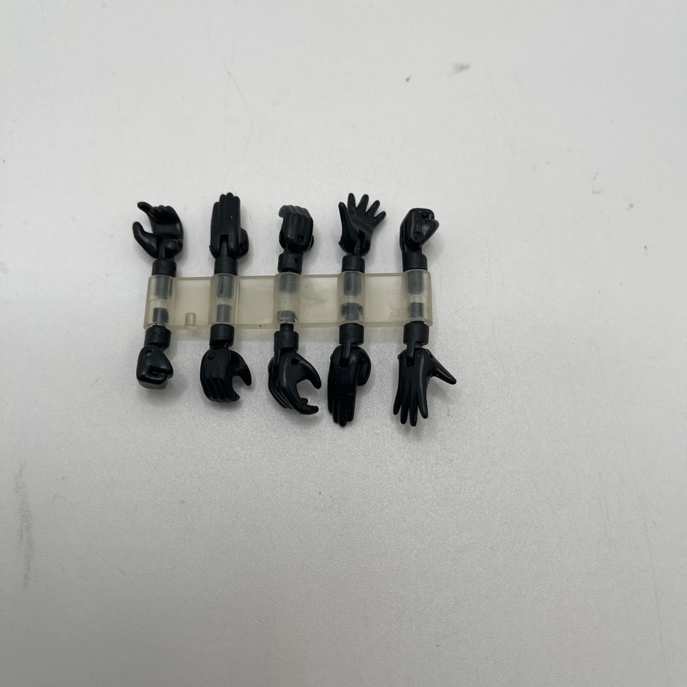 Microman replacement hand parts black
Used in good condition